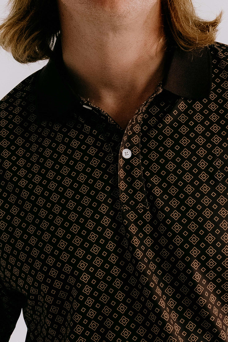 Close up of brown golf polo with collar