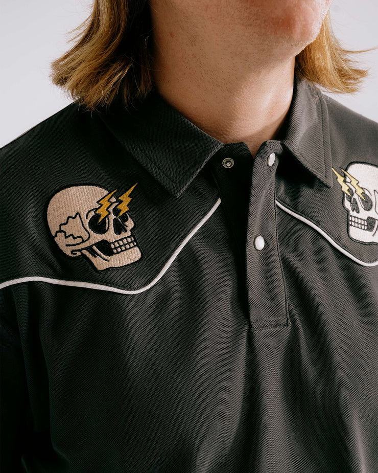 Black polo shirt with skull design