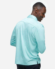 Turquoise blue performance jersey long sleeve button down with subtle mesh camo design